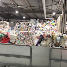 Baled household plastic packaging awaiting sorting