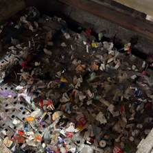Mixed household plastic in the shredder